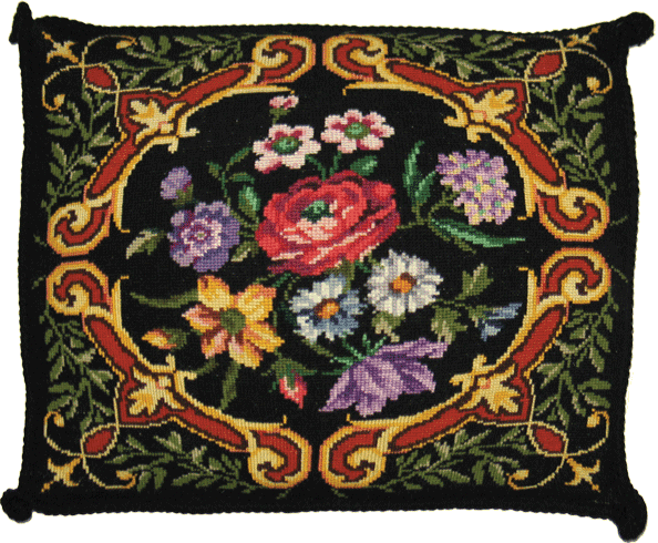 Подушка с цветами и орнаментом
